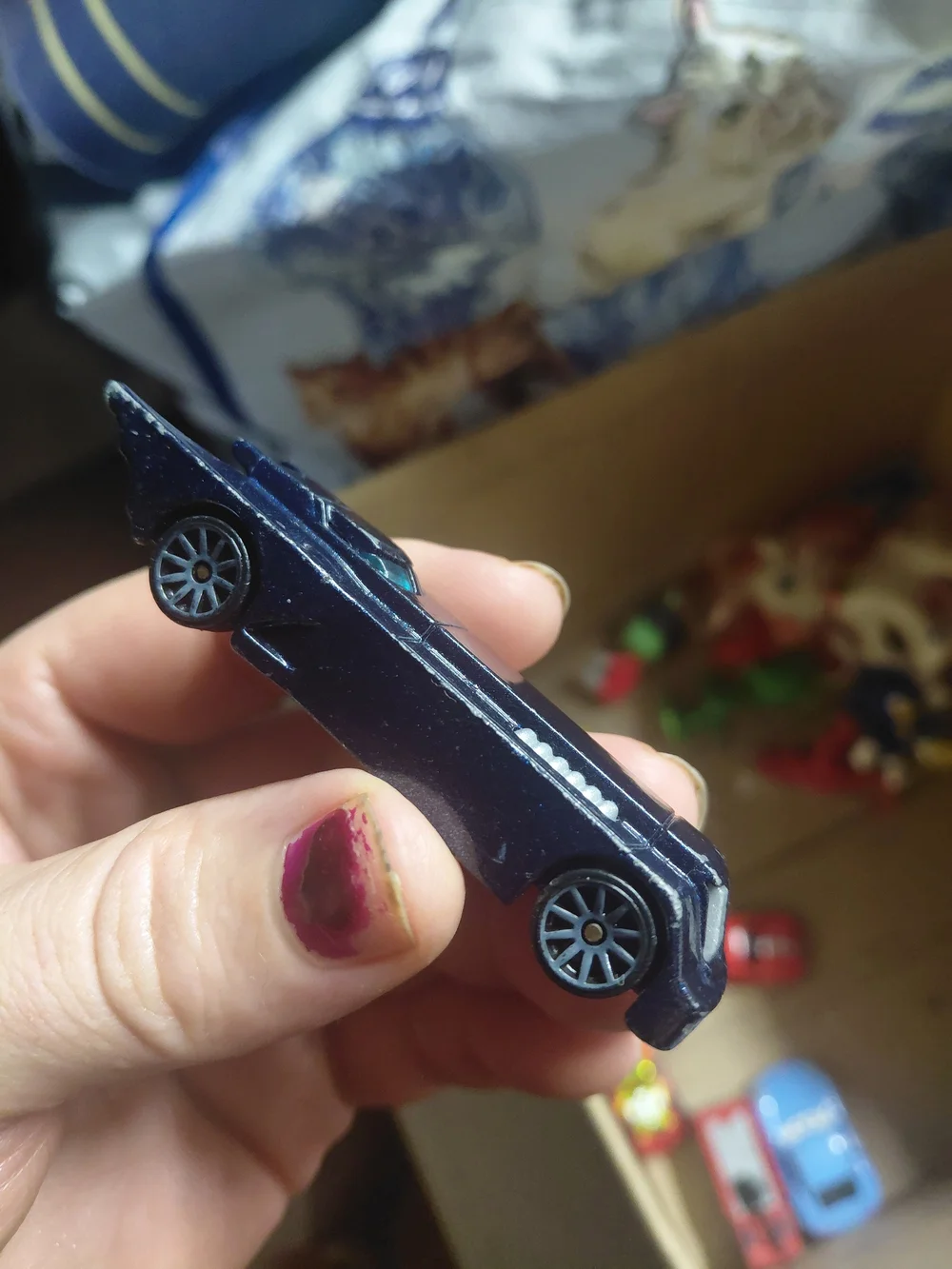 Hot Wheels die-cast toy based on the Batmobile from Batman: The Animated Series.